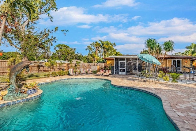 4301 S Lockwood Ridge Rd, Sarasota, FL 34231 - view of pool featuring a patio area and a sunroom