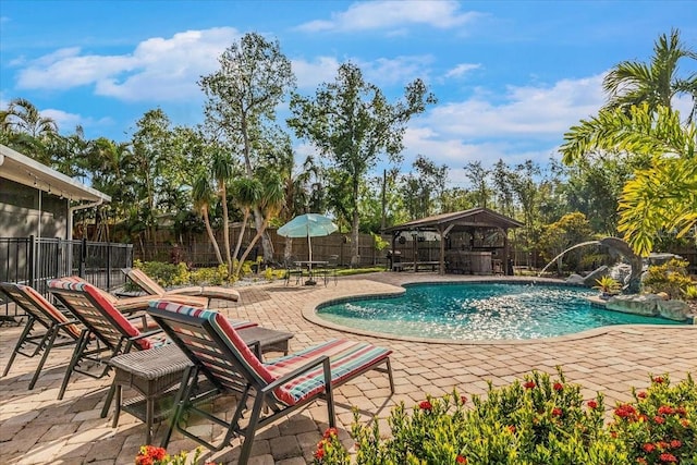 4301 S Lockwood Ridge Rd, Sarasota, FL 34231 - view of pool with a gazebo, a patio area, and a fenced backyard