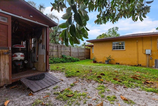 4301 S Lockwood Ridge Rd, Sarasota, FL 34231 - view of yard featuring central AC unit
