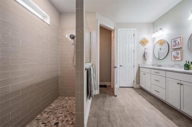 4620 Ballast Crest Cv, Land O Lakes, FL 34638 - full bathroom featuring double vanity, walk in shower, and wood finished floors