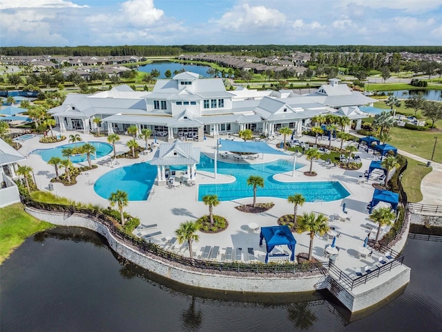4620 Ballast Crest Cv, Land O Lakes, FL 34638 - drone / aerial view of a pool area and a large body of water