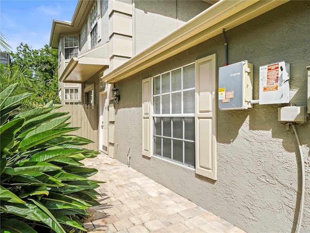14134 Trouville Dr, Tampa, FL 33624 - entrance to property featuring stucco siding