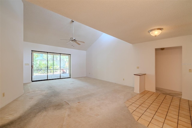1228 Rainbrook Cir, Valrico, FL 33596 - unfurnished room with a ceiling fan, light carpet, lofted ceiling, and a textured ceiling