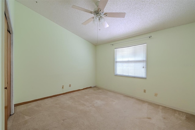 1228 Rainbrook Cir, Valrico, FL 33596 - unfurnished room with light carpet, a textured ceiling, baseboards, and ceiling fan