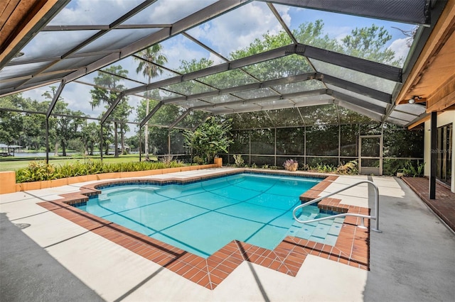707 Warren Rd, Lutz, FL 33548 - outdoor pool featuring a patio and a lanai
