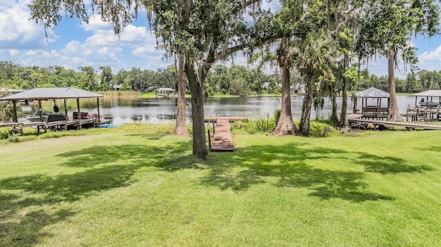 707 Warren Rd, Lutz, FL 33548 - view of green lawn with a water view, a gazebo, and view of wooded area