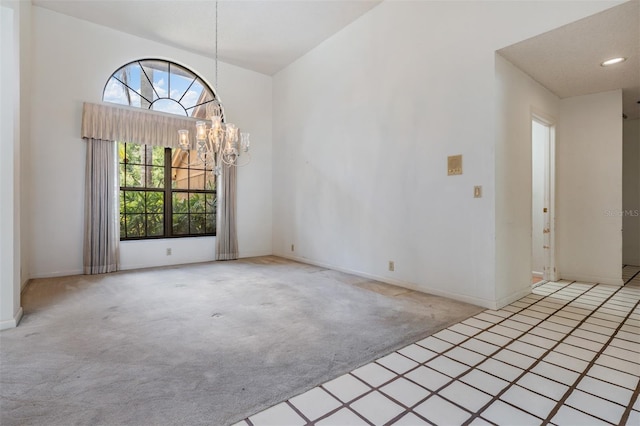 707 Warren Rd, Lutz, FL 33548 - unfurnished room with carpet floors, a chandelier, and baseboards