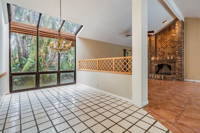 707 Warren Rd, Lutz, FL 33548 - unfurnished living room featuring a chandelier, tile patterned flooring, a skylight, and a brick fireplace