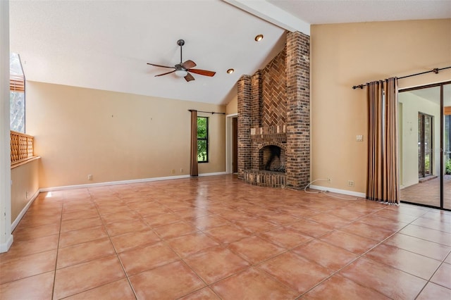 707 Warren Rd, Lutz, FL 33548 - unfurnished living room featuring high vaulted ceiling, a ceiling fan, beamed ceiling, light tile patterned floors, and a brick fireplace