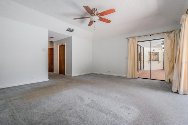 707 Warren Rd, Lutz, FL 33548 - spare room featuring ceiling fan, carpet, and baseboards