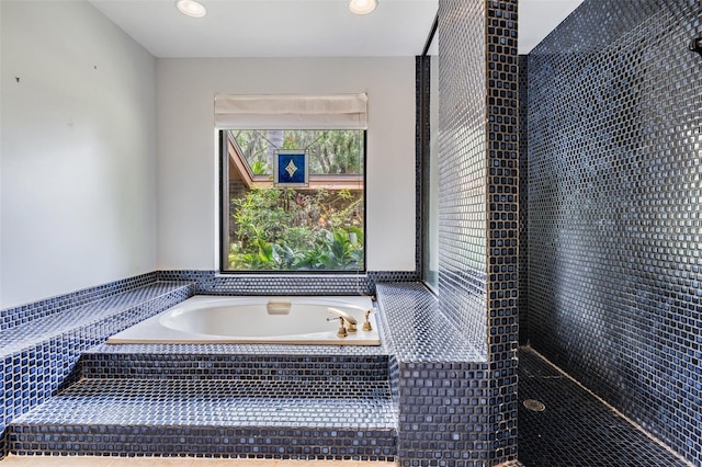 707 Warren Rd, Lutz, FL 33548 - full bathroom with a garden tub and recessed lighting