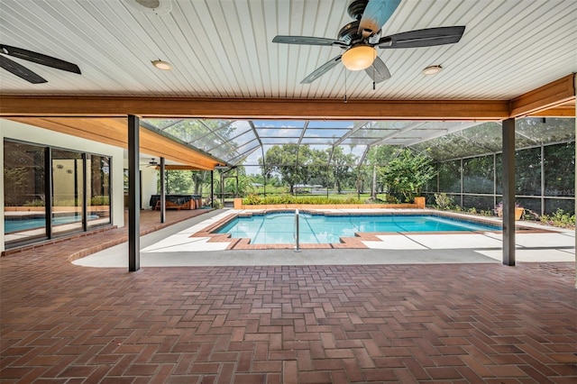 707 Warren Rd, Lutz, FL 33548 - outdoor pool featuring ceiling fan, a patio, and a lanai