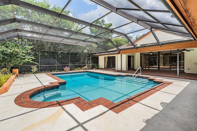 707 Warren Rd, Lutz, FL 33548 - outdoor pool with a patio area, a ceiling fan, and a lanai