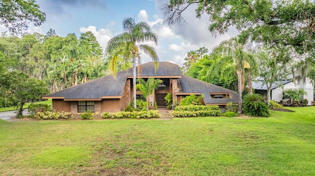 707 Warren Rd, Lutz, FL 33548 - view of front of home with a front lawn