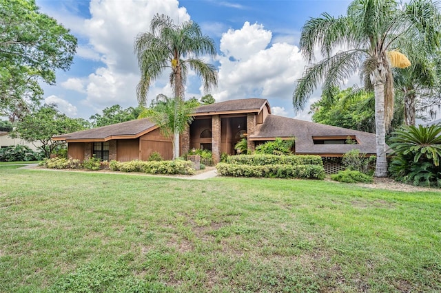 707 Warren Rd, Lutz, FL 33548 - view of front of property with a front yard