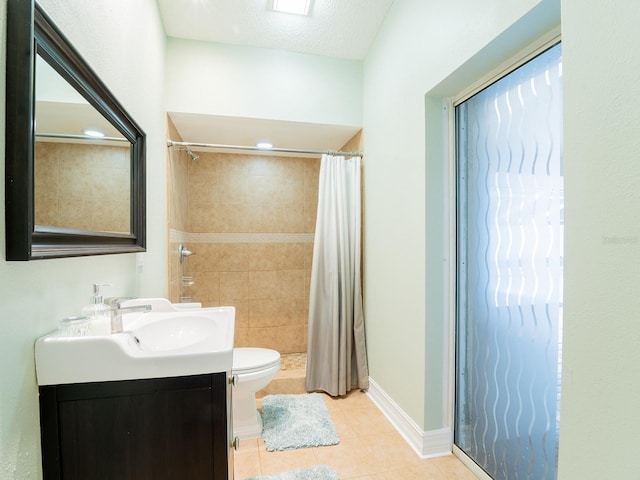 382 Florian Way, Spring Hill, FL 34609 - full bath featuring toilet, tile patterned floors, vanity, a tile shower, and baseboards