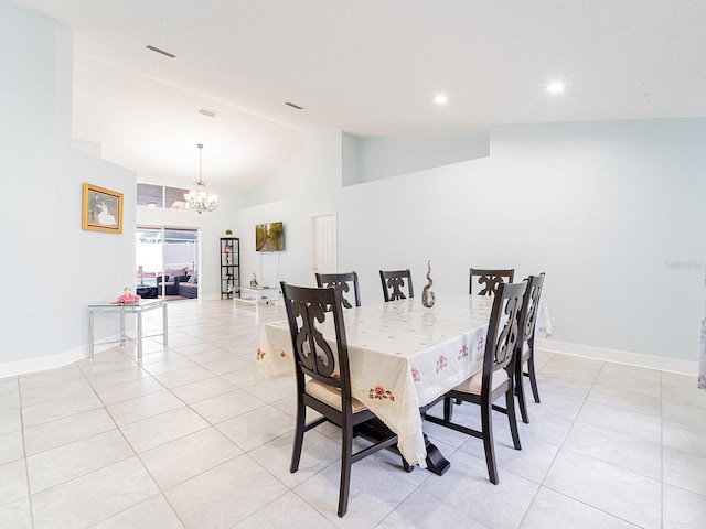382 Florian Way, Spring Hill, FL 34609 - dining area featuring lofted ceiling, light tile patterned floors, a chandelier, recessed lighting, and baseboards