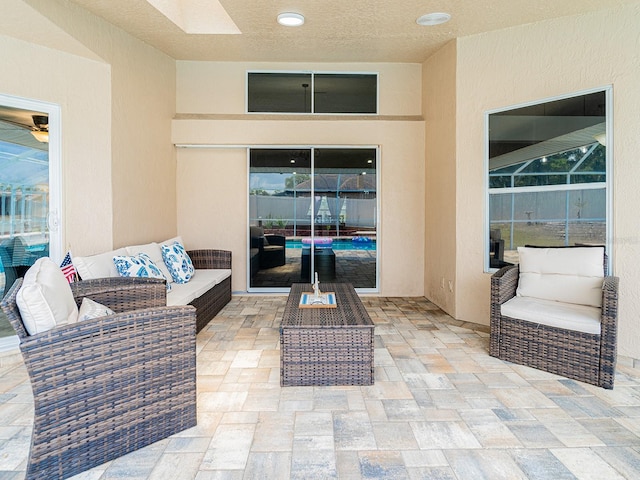 382 Florian Way, Spring Hill, FL 34609 - view of patio featuring outdoor lounge area and a lanai