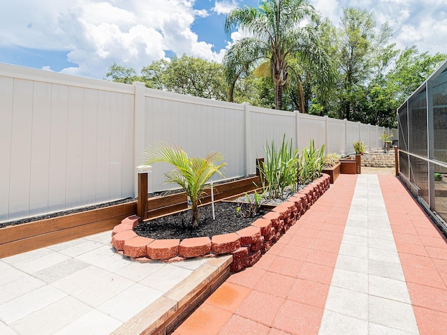 382 Florian Way, Spring Hill, FL 34609 - fenced backyard featuring a patio and a lanai