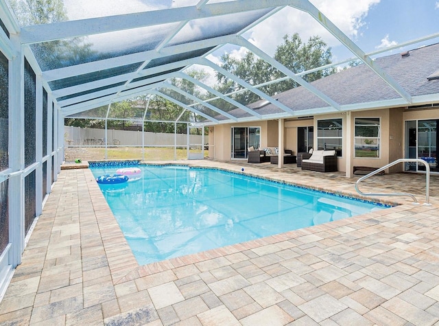 382 Florian Way, Spring Hill, FL 34609 - view of swimming pool with an outdoor living space, a patio area, and glass enclosure