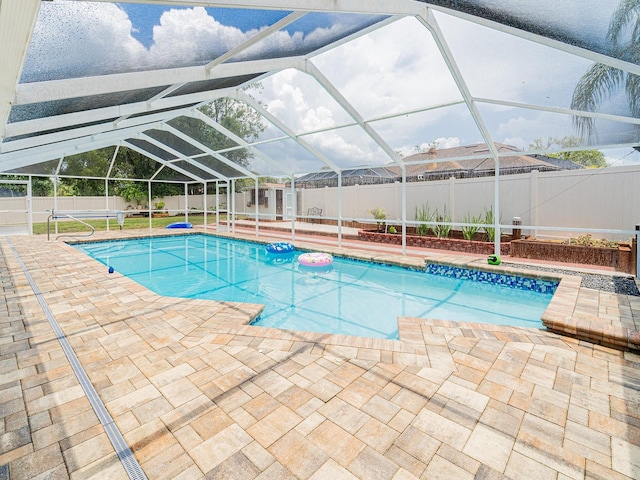382 Florian Way, Spring Hill, FL 34609 - view of swimming pool featuring a fenced backyard, a patio area, and a lanai