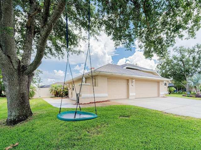 382 Florian Way, Spring Hill, FL 34609 - view of front of home featuring stucco siding, driveway, and an attached garage
