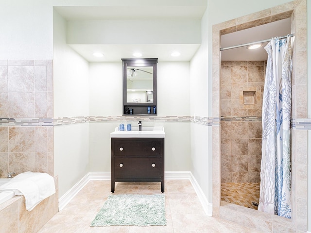 382 Florian Way, Spring Hill, FL 34609 - bathroom featuring tiled shower, vanity, tile patterned flooring, a bathtub, and recessed lighting