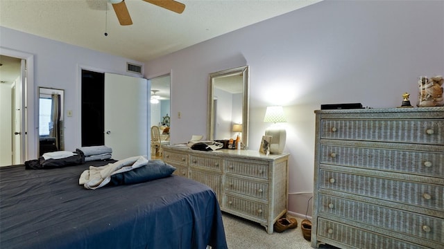 3534 Lake Bayshore Dr Unit 118, Bradenton, FL 34205 - bedroom featuring light carpet and ceiling fan