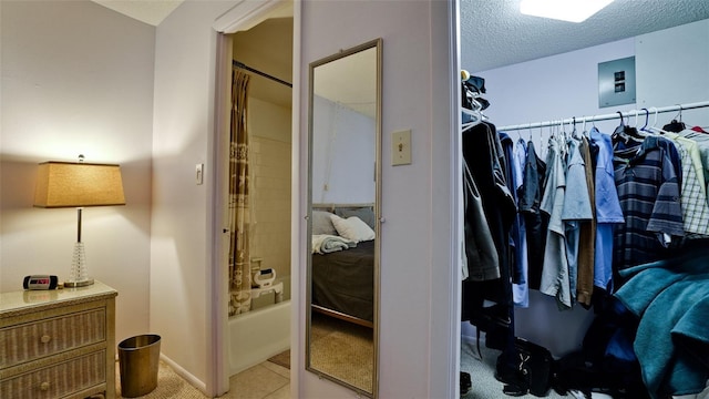 3534 Lake Bayshore Dr Unit 118, Bradenton, FL 34205 - spacious closet with light tile patterned flooring and electric panel