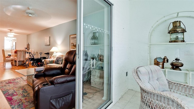 3534 Lake Bayshore Dr Unit 118, Bradenton, FL 34205 - living area with a ceiling fan