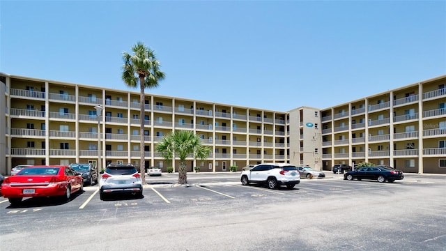 3534 Lake Bayshore Dr Unit 118, Bradenton, FL 34205 - view of apartment building / complex featuring uncovered parking