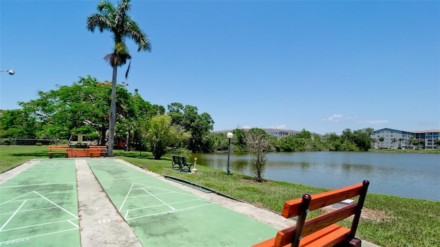 3534 Lake Bayshore Dr Unit 118, Bradenton, FL 34205 - view of property's community featuring a lawn, shuffleboard, and a water view