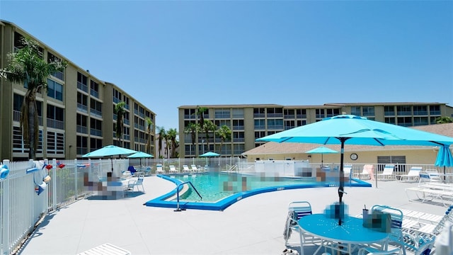 3534 Lake Bayshore Dr Unit 118, Bradenton, FL 34205 - community pool with a patio