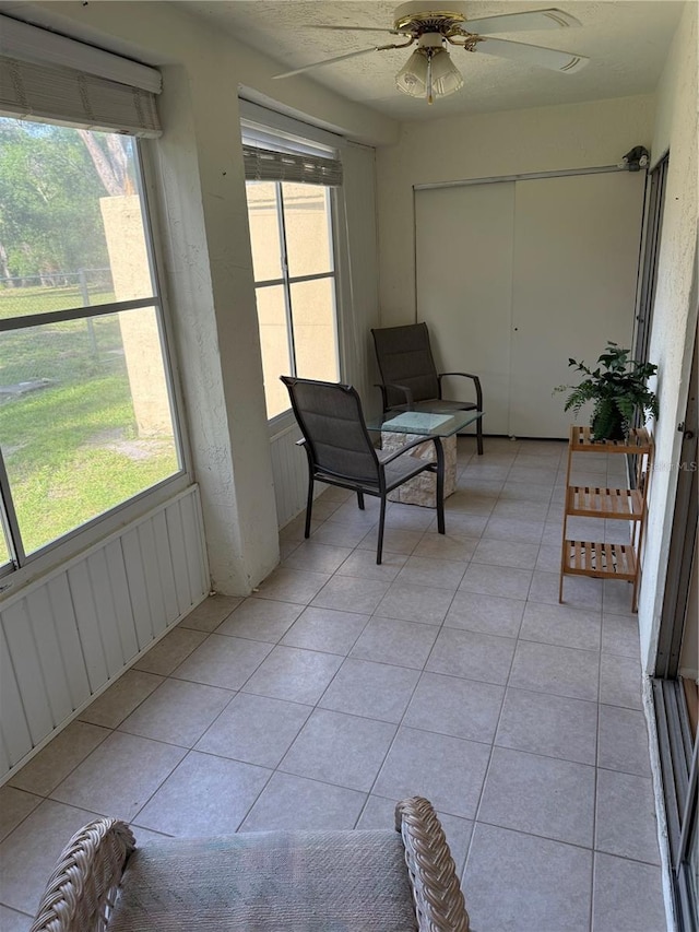 3534 Lake Bayshore Dr Unit 118, Bradenton, FL 34205 - sunroom / solarium featuring a ceiling fan and plenty of natural light
