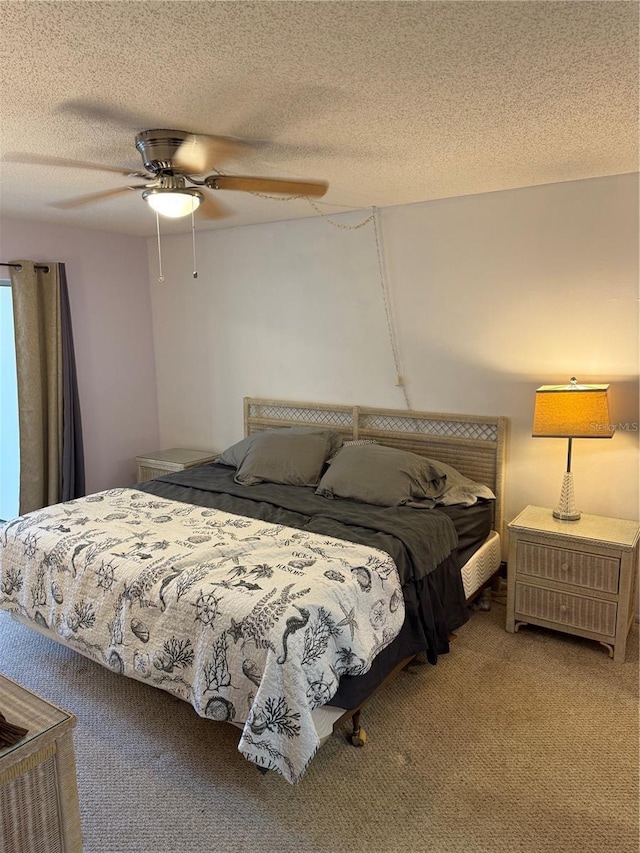 3534 Lake Bayshore Dr Unit 118, Bradenton, FL 34205 - bedroom with carpet flooring, a textured ceiling, and ceiling fan