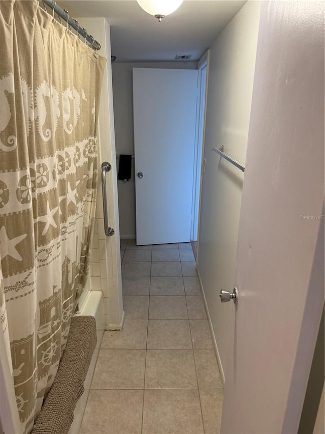 3534 Lake Bayshore Dr Unit 118, Bradenton, FL 34205 - full bathroom featuring tile patterned floors and baseboards