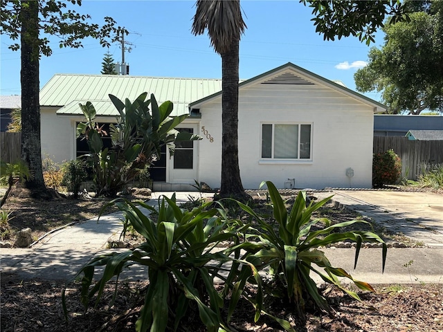 5008 N Suwanee Ave, Tampa, FL 33603 - ranch-style house featuring metal roof and concrete block siding