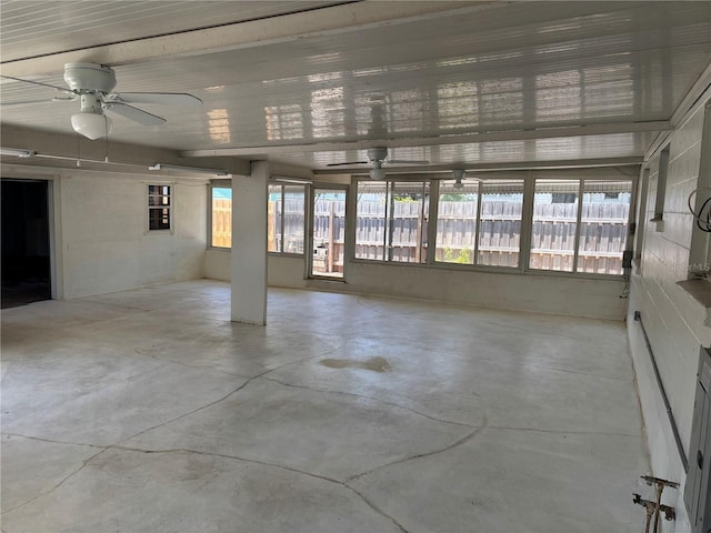 5008 N Suwanee Ave, Tampa, FL 33603 - unfurnished sunroom featuring ceiling fan