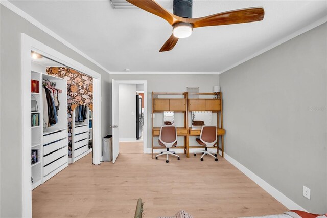 504 7th Ave SW, Largo, FL 33770 - office with light wood finished floors, ornamental molding, ceiling fan, and baseboards
