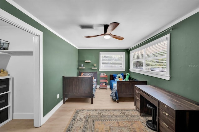 504 7th Ave SW, Largo, FL 33770 - office space featuring light wood finished floors, a ceiling fan, crown molding, and baseboards