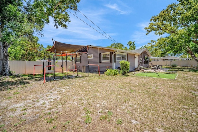 504 7th Ave SW, Largo, FL 33770 - rear view of house with central AC unit
