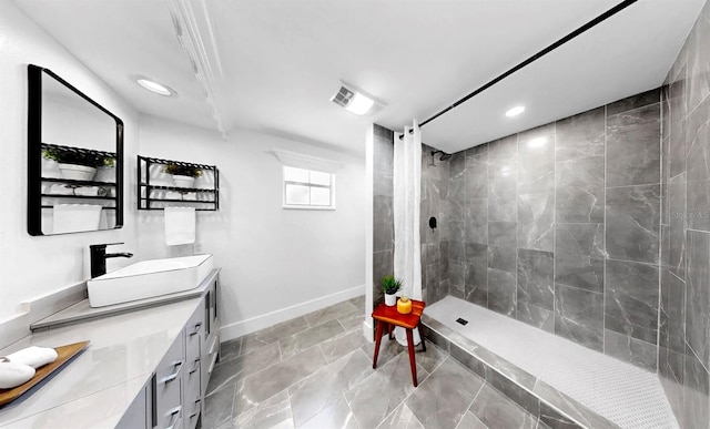 829 Riverside Dr, Tarpon Springs, FL 34689 - full bath featuring vanity, baseboards, tiled shower, and recessed lighting