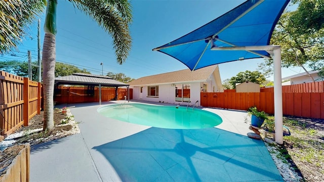 829 Riverside Dr, Tarpon Springs, FL 34689 - view of pool with a gazebo, a patio, and a fenced backyard