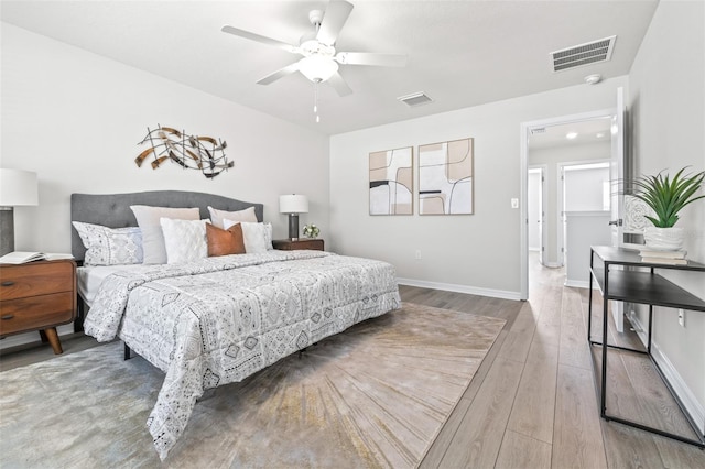6563 Ryestone Way, Wesley Chapel, FL 33545 - bedroom featuring wood finished floors, baseboards, and a ceiling fan