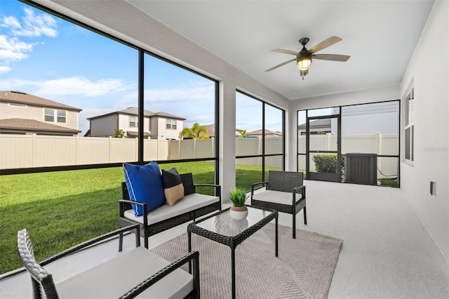 6563 Ryestone Way, Wesley Chapel, FL 33545 - sunroom / solarium featuring a ceiling fan, outdoor lounge area, and a residential view