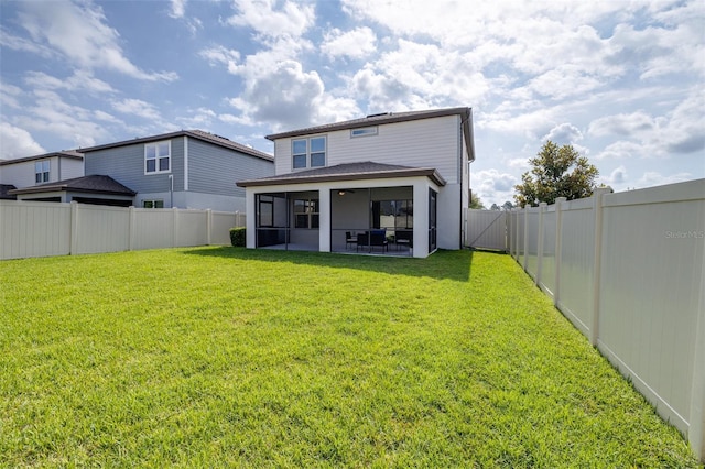 6563 Ryestone Way, Wesley Chapel, FL 33545 - back of property featuring a sunroom