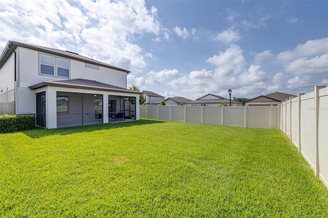6563 Ryestone Way, Wesley Chapel, FL 33545 - back of house with a sunroom