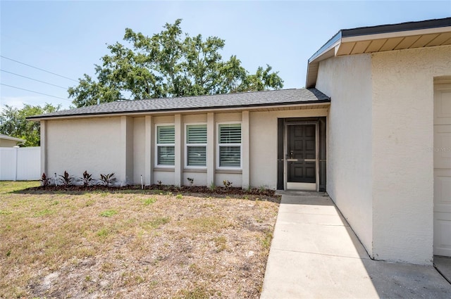 1818 Willow Oak Dr, Palm Harbor, FL 34683 - entrance to property with stucco siding