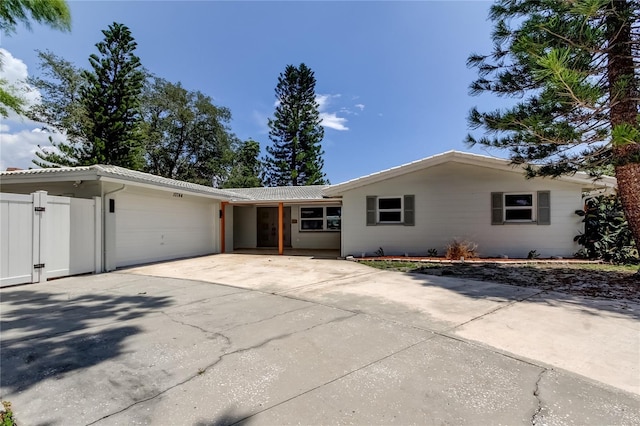 10744 Drummond Rd, Tampa, FL 33615 - single story home featuring an attached garage and driveway