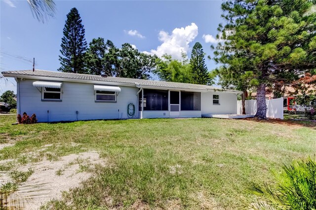 10744 Drummond Rd, Tampa, FL 33615 - back of house with a sunroom